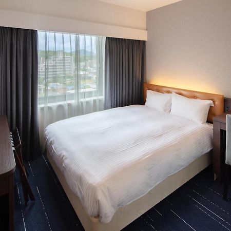 Shin Iizuka Station Hotel Buitenkant foto