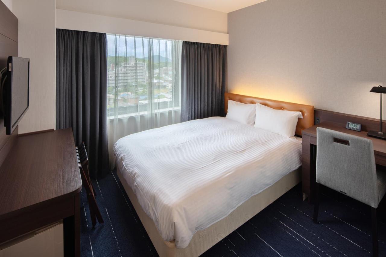 Shin Iizuka Station Hotel Buitenkant foto